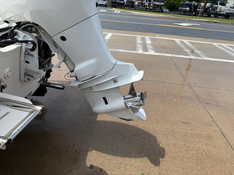 Slide: The Image of 2022 Carolina Skiff 21 LS boat motor and propeller on a concrete surface. - 46