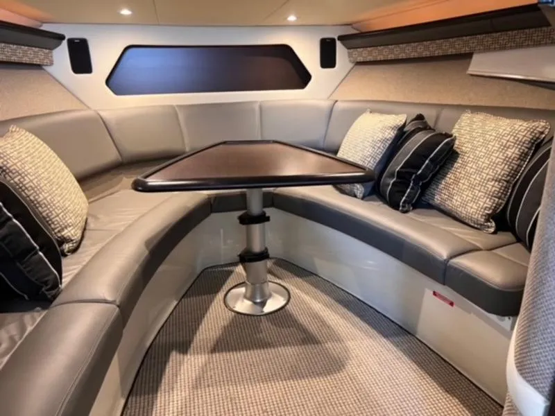 Slide: The Image of Luxurious interior of 2019 Cobalt A40 boat with plush seating and elegant table. - 8