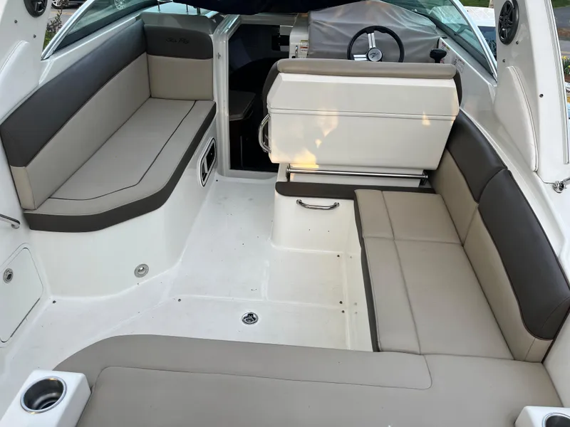 Slide: The Image of 2014 Sea Ray 260 Sundancer boat interior with spacious seating and modern design. - 24