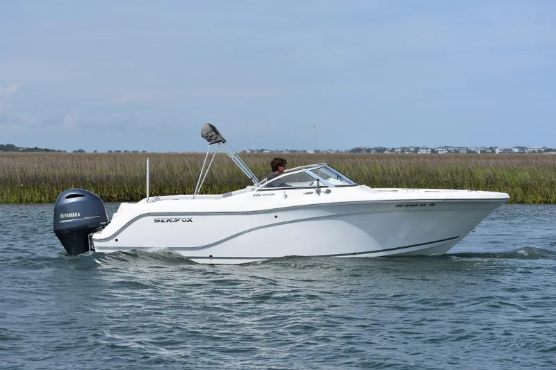 Slide: The Image of 2020 Sea Fox 226 Traveler boat cruising on calm water. - 3