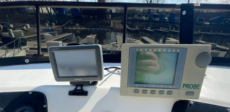 Slide: The Image of Control panel of a 1984 Bluewater 42 Coastal Cruiser with navigation equipment. - 15