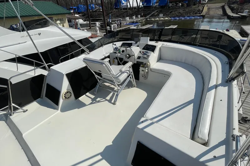 Slide: The Image of 1984 Bluewater 42 Coastal Cruiser yacht with spacious upper deck and seating area. - 16