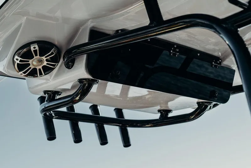 Slide: The Image of 2025 Key West 239FSR boat underside with rod holders and speaker. - 12