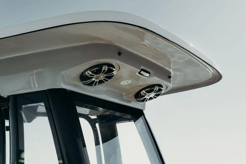 Slide: The Image of 2025 Key West 239FSR boat roof with built-in speakers and sleek design. - 9