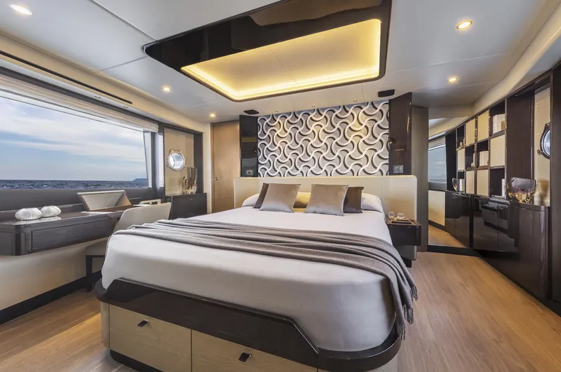 Slide: The Image of Luxurious bedroom interior on 2025 Absolute 60 Fly Co Ownership yacht, featuring modern design and elegant decor. - 11
