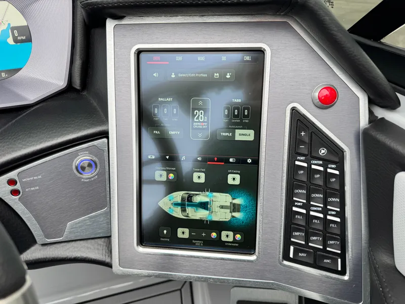 Slide: The Image of Dashboard of a 2022 MasterCraft XT21 boat with touchscreen controls and navigation display. - 15