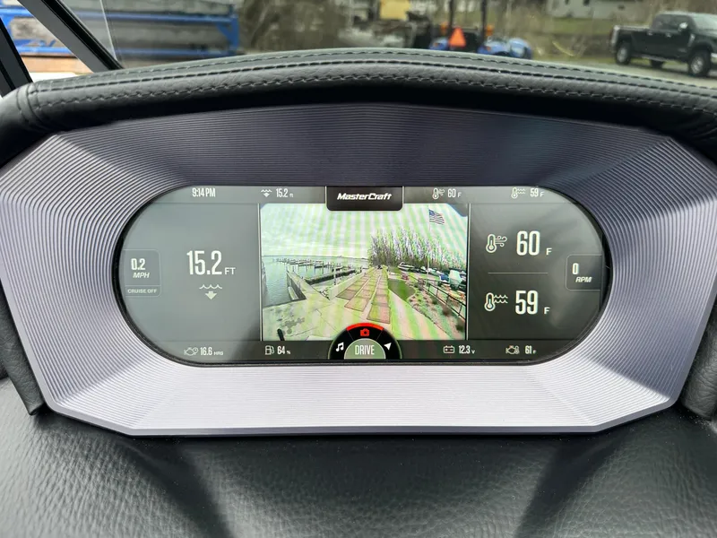 Slide: The Image of Dashboard of a 2022 MasterCraft XT21 boat displaying navigation and temperature data. - 16