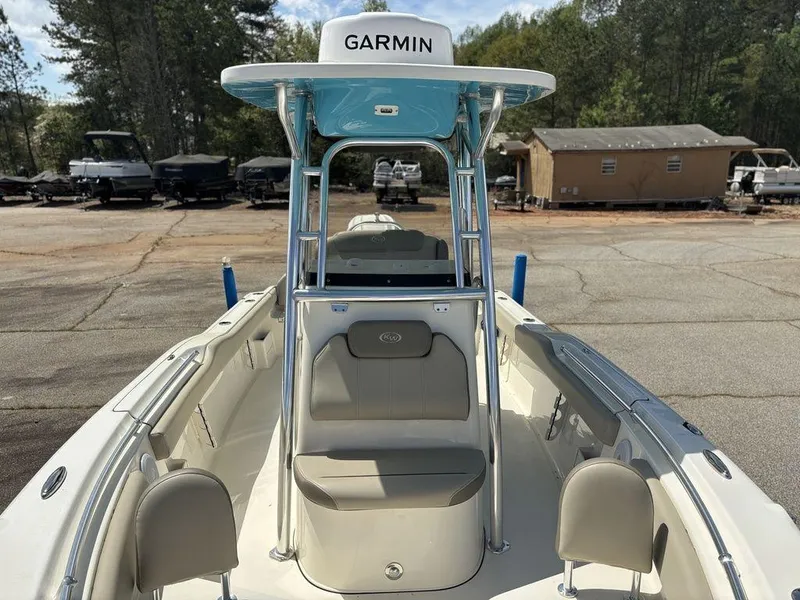 Slide: The Image of 2022 Key West 239FS boat with Garmin equipment, docked outdoors. - 19