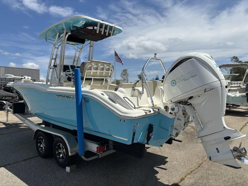 Slide: The Image of 2022 Key West 239FS boat on trailer, featuring a Yamaha outboard motor. - 4