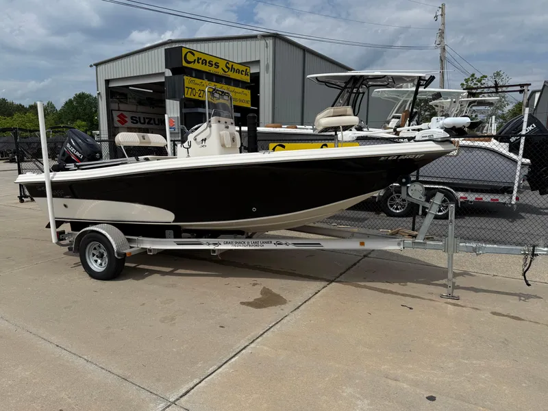Slide: The Image of 2015 Carolina Skiff 19 Sea Skiff on trailer outside dealership. - 0