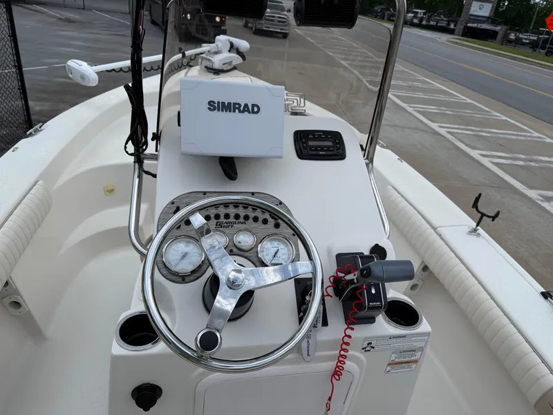 Slide: The Image of 2015 Carolina Skiff 19 Sea Skiff boat console with Simrad navigation system. - 12