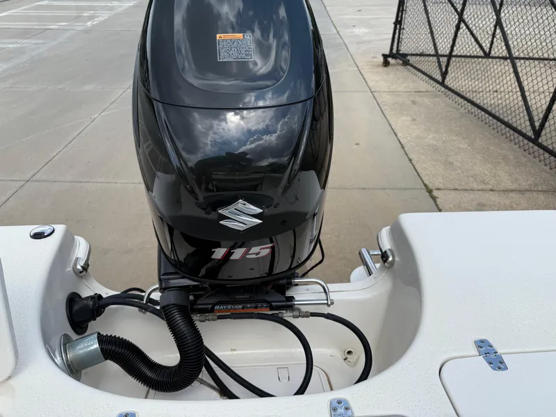 Slide: The Image of 2015 Carolina Skiff 19 Sea Skiff with Suzuki 115 outboard motor. - 31