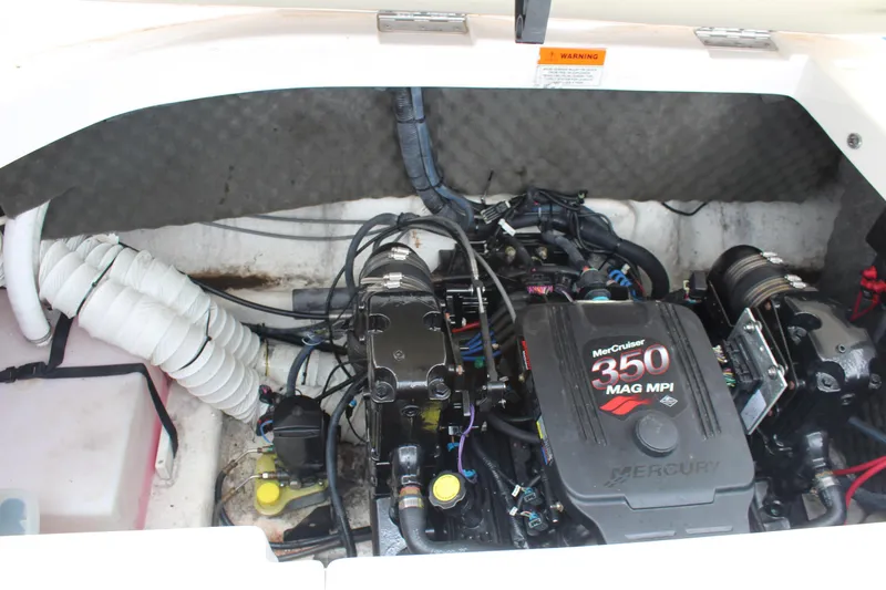 Slide: The Image of Engine compartment of 2007 Rinker 246 Captiva Bowrider with MerCruiser 350 MAG MPI. - 23