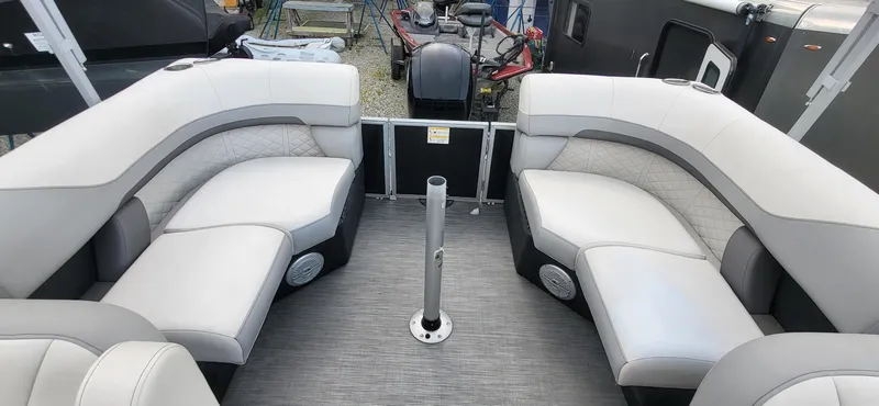 Slide: The Image of 2022 Lowe SS 210 boat interior with gray seating and central pole. - 4