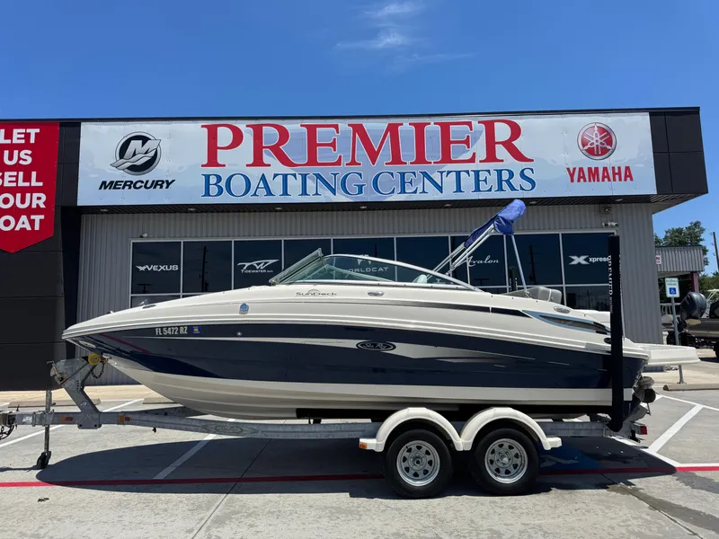 Slide: The Image of 2010 Sea Ray 220 Sundeck boat on trailer at Premier Boating Centers. - 5