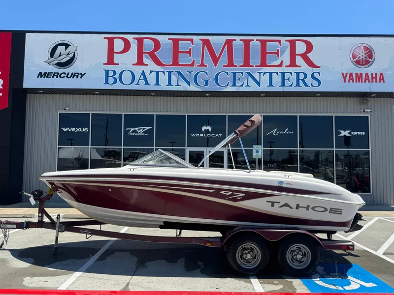 Slide: The Image of 2015 TAHOE Q7I boat on trailer at Premier Boating Centers dealership. - 25