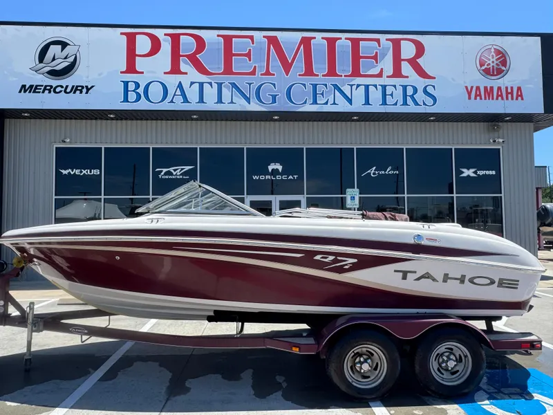 Slide: The Image of 2015 TAHOE Q7I boat on trailer at Premier Boating Centers dealership. - 7