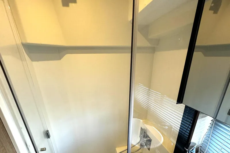 Slide: The Image of Modern bathroom interior on 2019 Prestige 460 Fly Bridge yacht. - 29