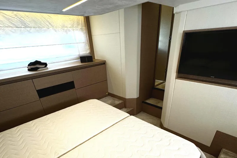 Slide: The Image of Luxurious bedroom interior of 2019 Prestige 460 Fly Bridge yacht with modern furnishings. - 31