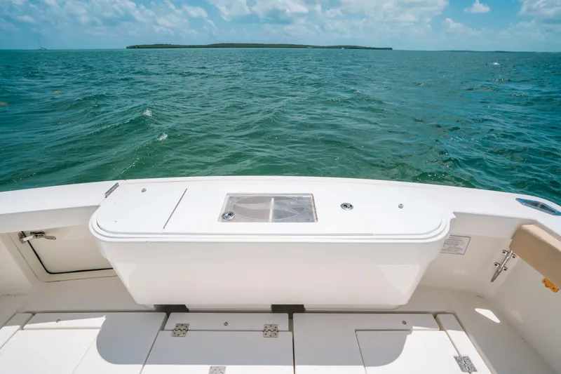 Slide: The Image of 2007 Rampage 38 Express boat deck overlooking ocean and distant island. - 22