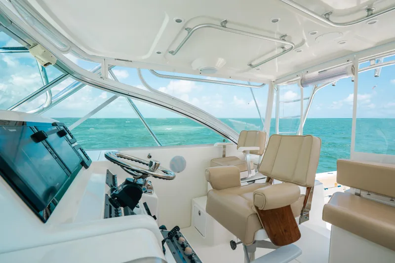Slide: The Image of Interior of 2007 Rampage 38 Express yacht with ocean view. - 6