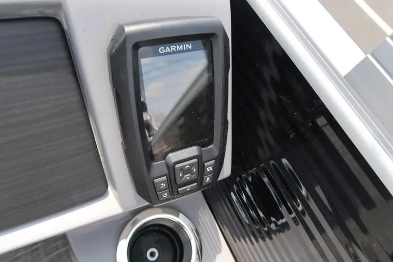 Slide: The Image of Garmin device on 2025 Bennington L Swingback 23 LSB boat dashboard. - 13