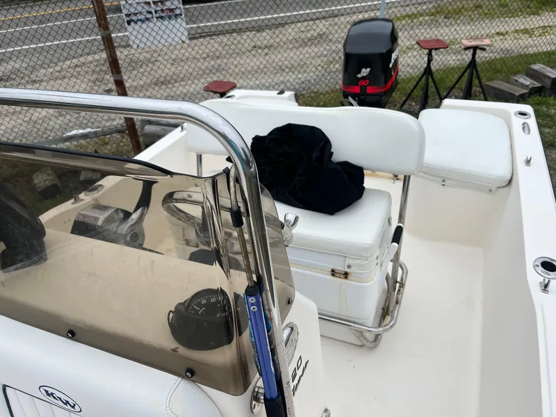 Slide: The Image of 2006 Key West 1720 Center Console boat interior with seating and controls. - 7