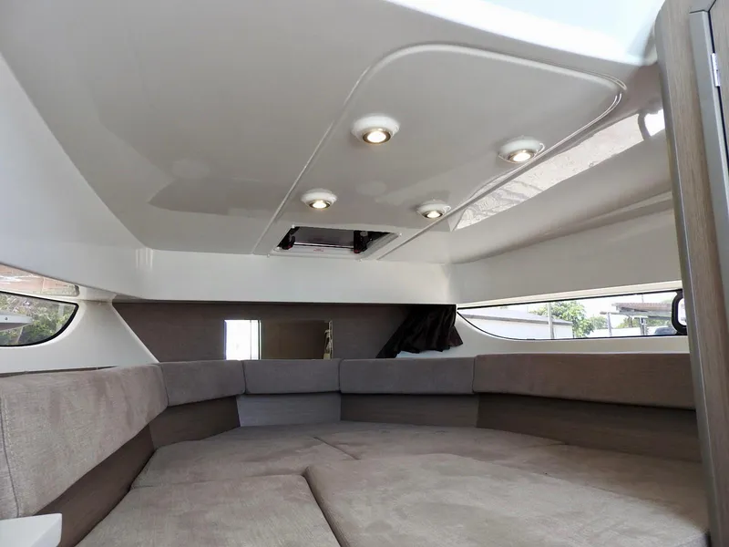 Slide: The Image of Interior cabin of 2023 Beneteau Flyer 9 SUNdeck with modern lighting and seating. - 13