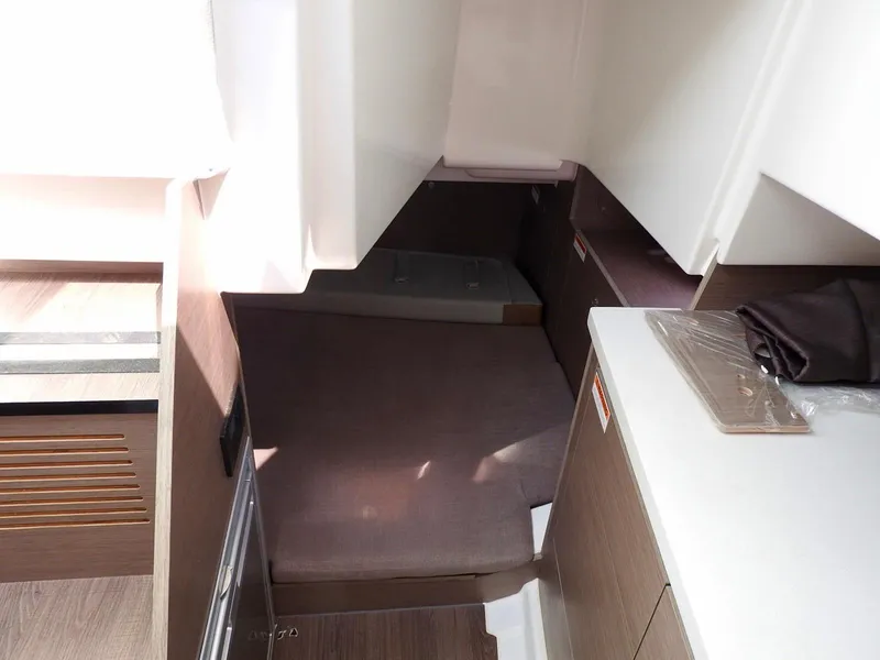 Slide: The Image of 2023 Beneteau Flyer 9 SUNdeck cabin interior with modern wood finish. - 17