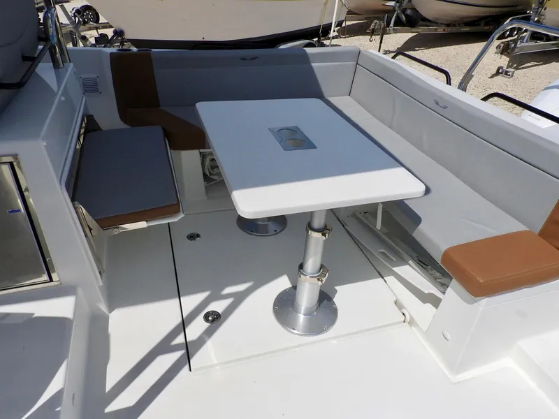 Slide: The Image of 2023 Beneteau Flyer 9 SUNdeck interior with seating and table, featuring modern design. - 29