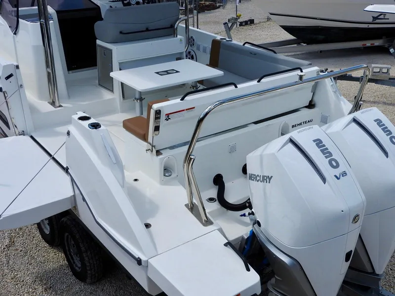 Slide: The Image of 2023 Beneteau Flyer 9 SUNdeck with dual Mercury V8 engines, featuring spacious deck and seating. - 31