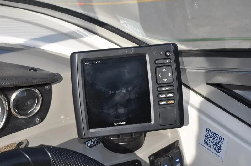 Slide: The Image of Garmin navigation system on 2018 Stingray 214 LR boat dashboard. - 17