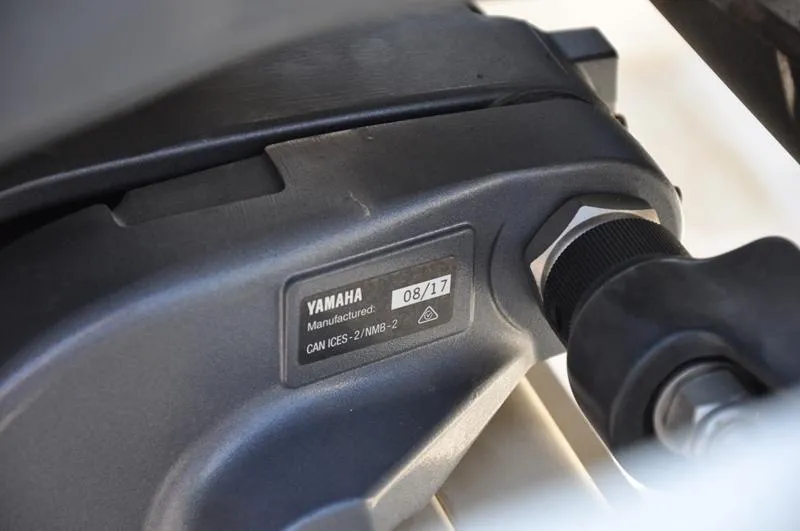 Slide: The Image of Close-up of Yamaha engine component on 2018 Stingray 214 LR boat. - 27