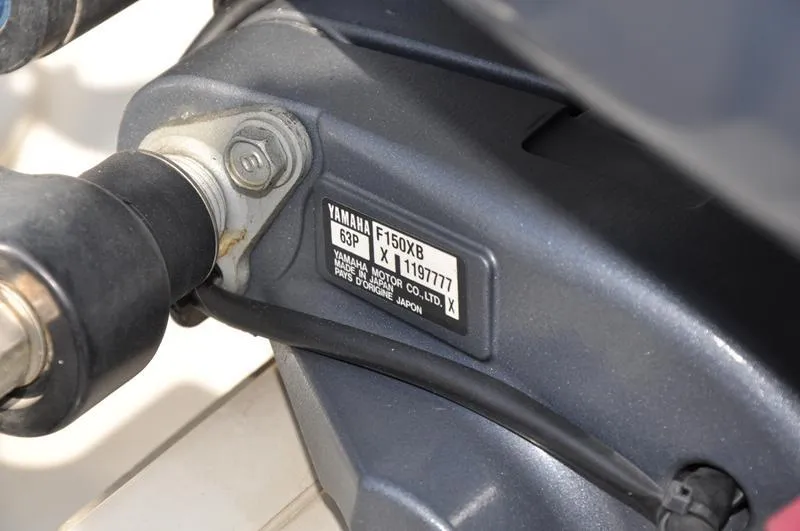 Slide: The Image of 2018 Stingray 214 LR boat with Yamaha F150XB engine label detail. - 28