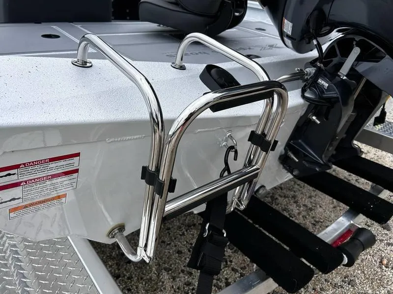 Slide: The Image of Chrome ladder on 2025 Xpress H18 Bass boat, rear view. - 15
