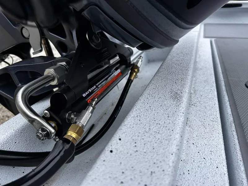Slide: The Image of Close-up of 2025 Xpress H18 Bass boat hydraulic steering system. - 16