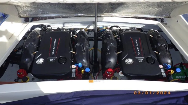 Slide: The Image of Twin engines of a 2017 Chris-Craft Launch 28 boat, showcasing powerful performance. - 20