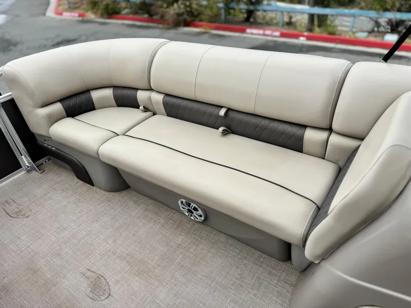 Slide: The Image of 2023 Sun Tracker Party Barge 20 DLX pontoon boat seating, beige upholstery, spacious and comfortable design. - 10