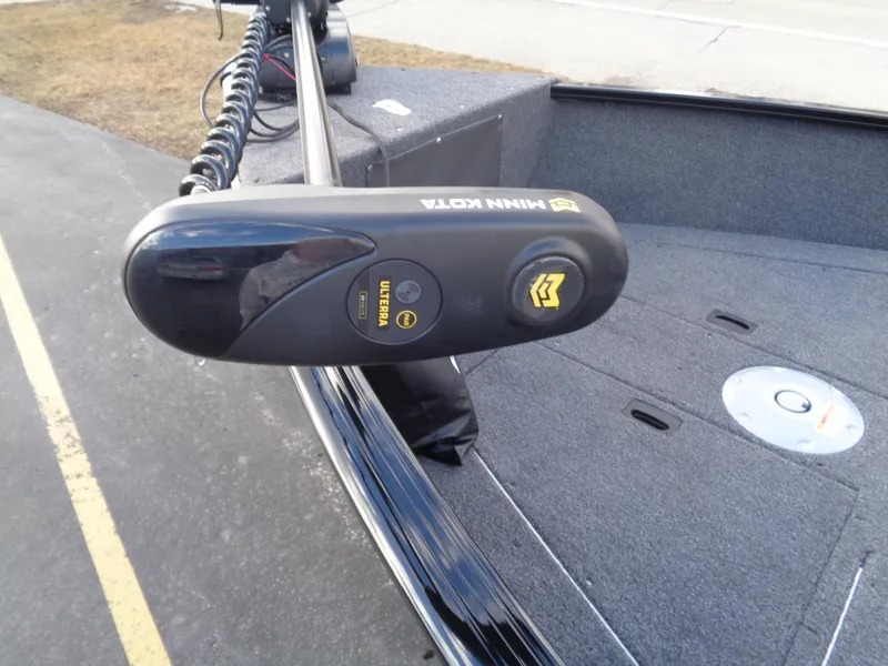 Slide: The Image of 2025 Lund 1650 Rebel XL SS boat with Minn Kota trolling motor. - 13