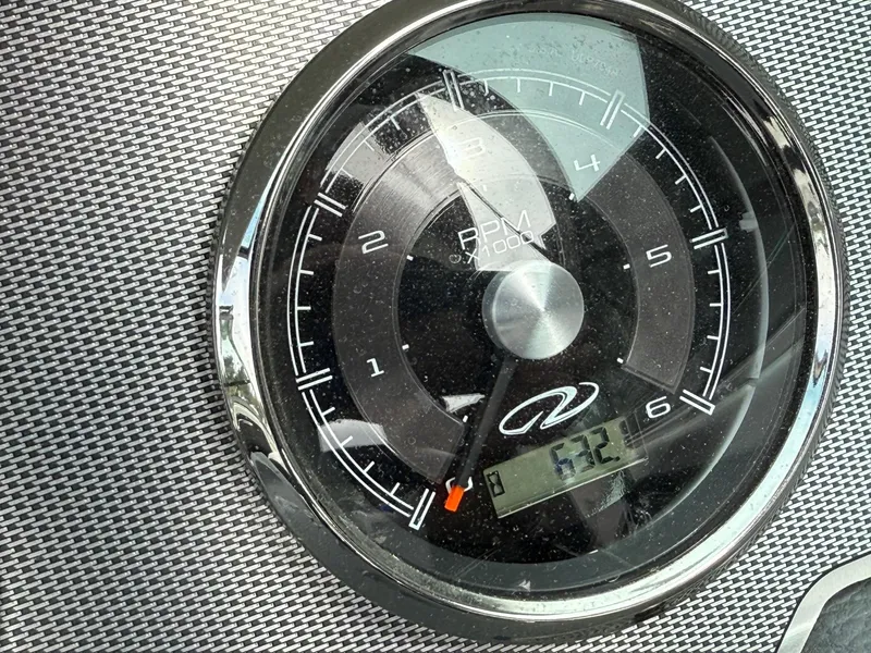 Slide: The Image of Tachometer of 2016 Regal 2300 Bowrider showing RPM and digital display. - 3