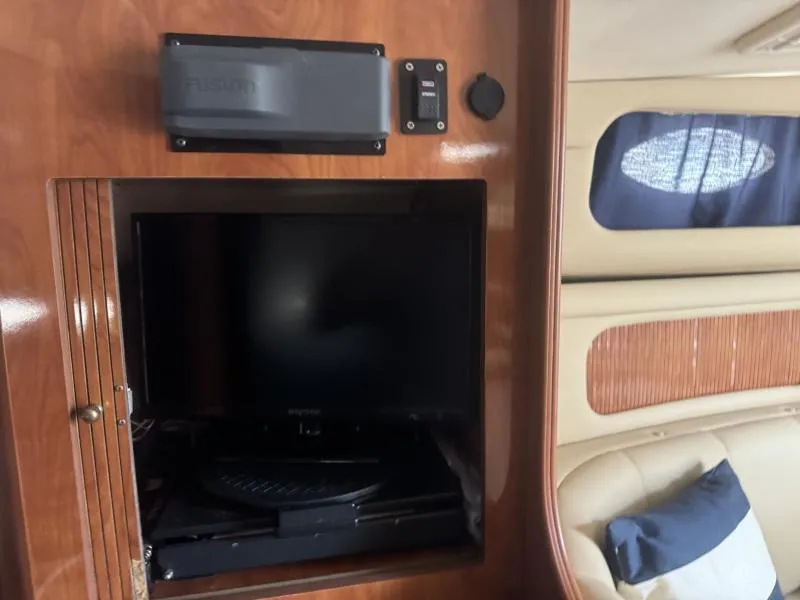 Slide: The Image of Interior of 2004 Rinker 342 Fiesta Vee with TV and audio system. - 18