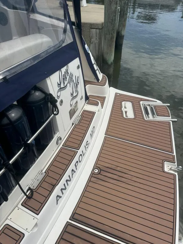 Slide: The Image of 2004 Rinker 342 Fiesta Vee boat docked in Annapolis, MD, with teak deck. - 7