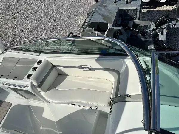 Slide: The Image of 2012 Formula 350 SS boat interior with white seating and cup holders. - 9