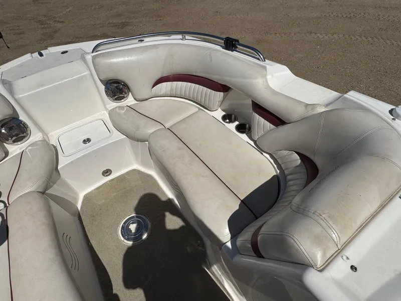 Slide: The Image of Storage compartment of a 2008 Hurricane SunDeck 2400 IO boat, showing interior details. - 18