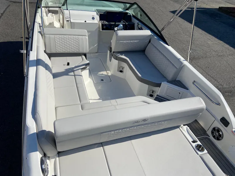 Slide: The Image of 2023 Sea Ray SDX 250 boat interior with spacious seating and modern design. - 6