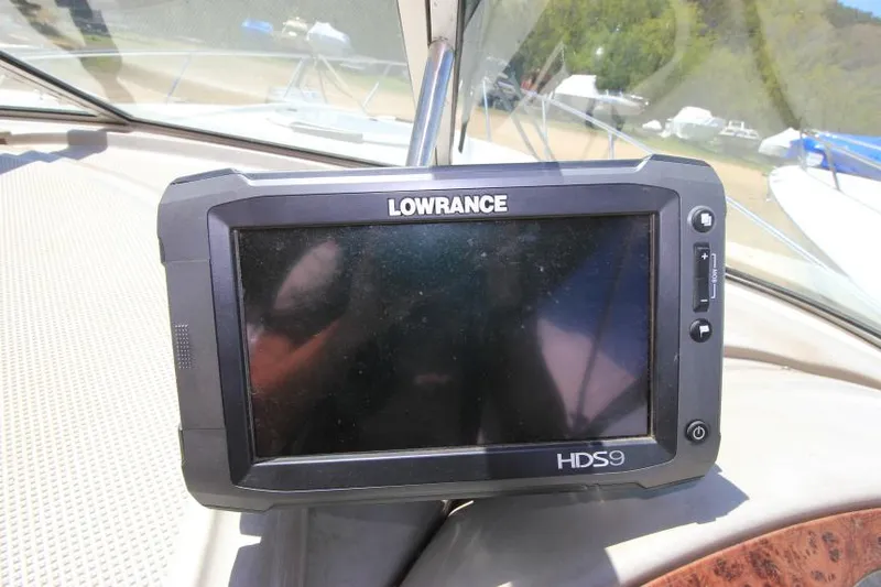 Slide: The Image of Lowrance HDS9 marine GPS on 1999 Maxum 2800 SCR boat dashboard. - 11
