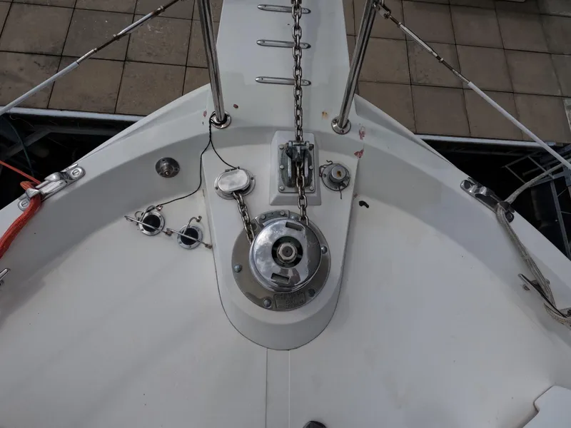 Slide: The Image of Bow of 1988 Viking Gulfstar 55 MY yacht with anchor chain and winch. - 25