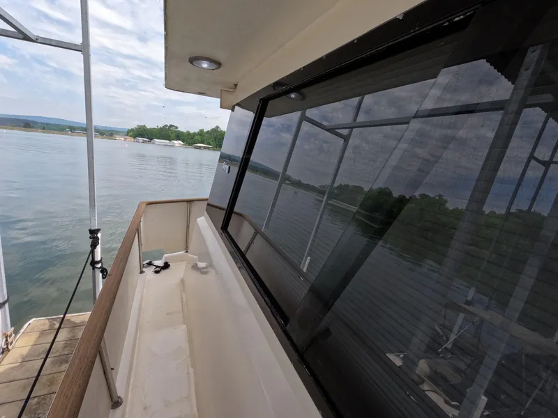 Slide: The Image of 1988 Viking Gulfstar 55 MY yacht deck with scenic water view. - 35