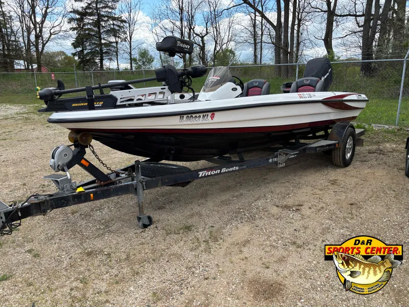 Slide: The Image of 2009 Triton 18X3 SC boat on trailer at DAR Sports Center. - 2