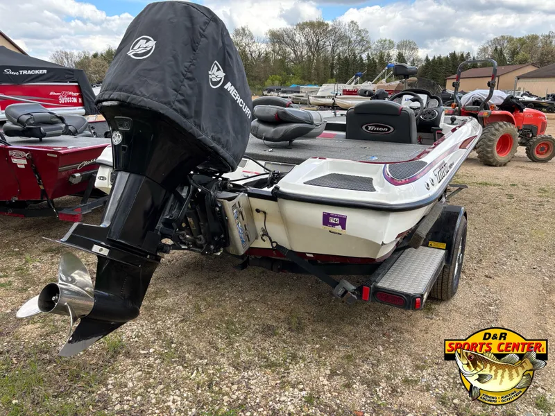 Slide: The Image of 2009 Triton 18X3 SC boat with Mercury engine, displayed at D&R Sports Center. - 3